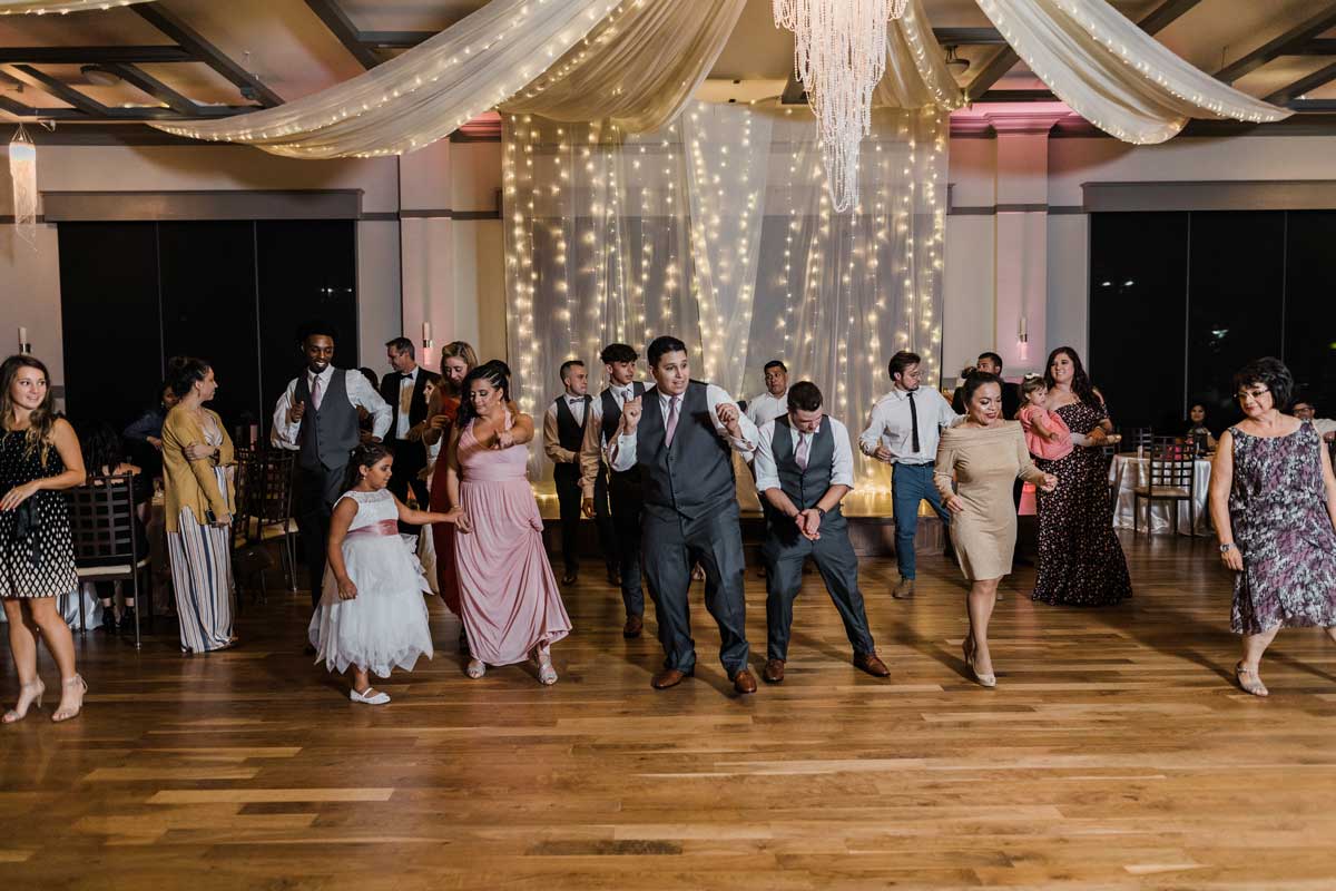 photo of wedding guests dancing on the dance floor