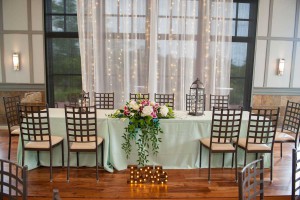 bride and groom table decorated in mint green palette at The Ark in Katy