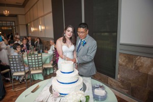 photo of the bride and groom cutting the cake at The Ark in Katy