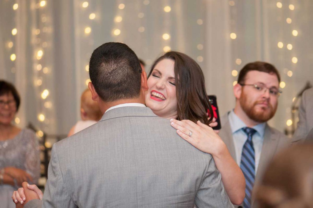 theArk-event-venue-dickinson-7512_w close up photo of bride and groom dancing at The Ark in Katy