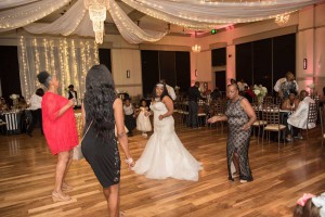 bride and guests dancing at the reception at The Ark in Katy